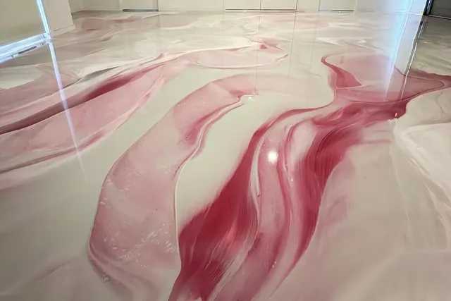 White metallic epoxy floor with rose and pink veins