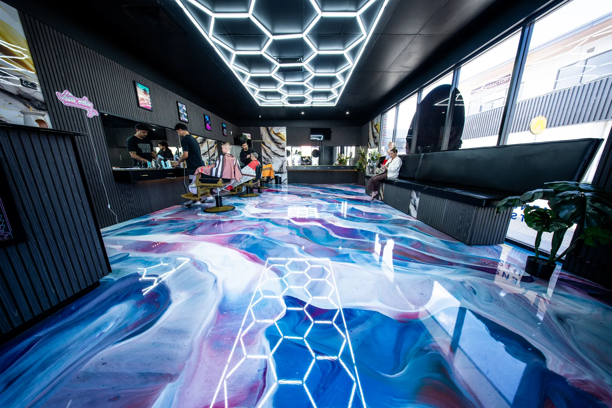 Pink and blue metallic epoxy floor at Vice City Barbers on the Sunshine Coast